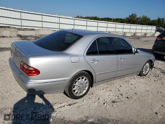 2002 Mercedes-Benz E-Class with VIN WDBJF82J42X077731, listed as a Copart auction lot 70280584 with 169,018 mi miles and Salvage Title. Bid and sale history available at carsss.com. Image 3.
