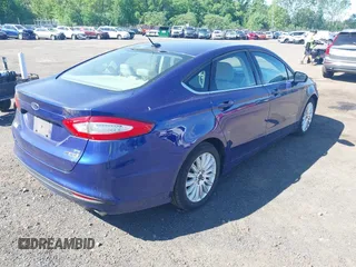 2016 Ford Fusion SE Hybrid with VIN 3FA6P0LU9GR154646, listed as a IAAI auction lot 42307247 with 181,445 mi miles and . Bid and sale history available at DreamBid. Image 4.