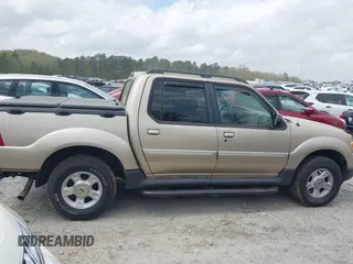 2002 Ford Explorer Sport Trac Value z VIN 1FMZU67E32UB39918, wystawiony jako IAAI lot #41937332 z przebiegiem 201 713 mil mil oraz . Historia ofert i sprzedaży dostępna na DreamBid. Obrazek 13.
