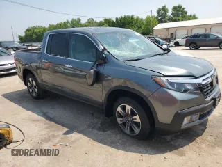 2017 Honda Ridgeline RTL-E with VIN 5FPYK3F74HB039715, listed as a Copart auction lot 60271415 with 56,892 mi miles and Salvage title. Bid and sale history available at DreamBid. Image 4.