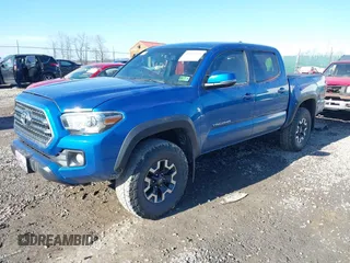 2017 Toyota Tacoma SR5 with VIN 5TFCZ5AN9HX065765, listed as a IAAI auction lot 41652944 with 82,590 mi miles and . Bid and sale history available at DreamBid. Image 2.