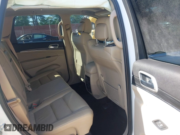 2022 Jeep Grand Cherokee Limited with VIN 1C4RJEBG9NC126472, listed as a IAAI auction lot 42008318 with 77,508 mi miles and . Bid and sale history available at DreamBid. Image 8.