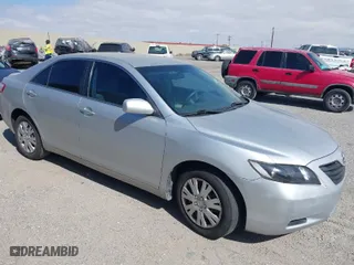 2007 Toyota Camry CE with VIN 4T1BE46K07U532647, listed as a IAAI auction lot 42075663 with 125,736 mi miles. Bid and sale history available at carsss.com. Image 1.