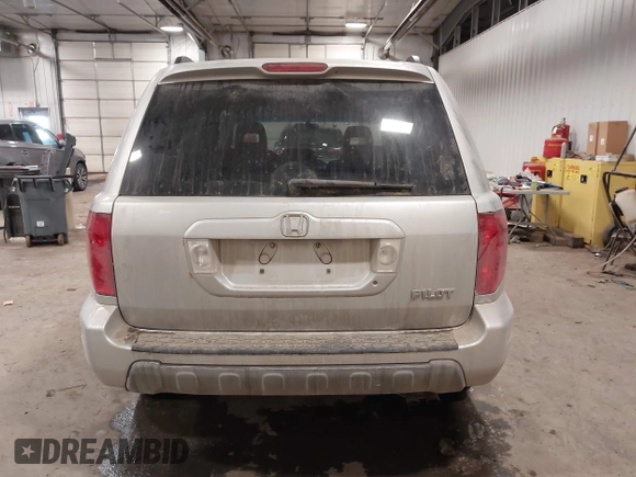 2005 Honda Pilot EX-L with VIN 2HKYF18575H557005, listed as a IAAI auction lot 41647830 with 245,992 mi miles. Bid and sale history available at carsss.com. Image 16.