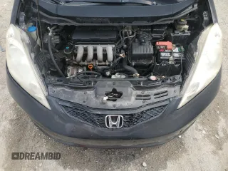 2009 Honda Fit Sport with VIN JHMGE88479S060797, listed as a Copart auction lot 54009135 with 167,914 mi miles and Salvage Title. Bid and sale history available at carsss.com. Image 11.