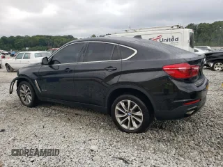 2017 BMW X6 sDrive35i with VIN 5UXKU0C34H0G69243, listed as a Copart auction lot 69607524 with 105,996 mi miles and Salvage Title. Bid and sale history available at carsss.com. Image 2.