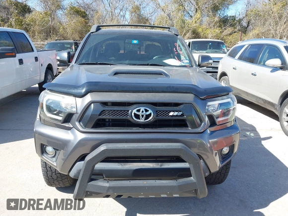 2014 Toyota Tacoma PreRunner with VIN 5TFJU4GN3EX057731, listed as a IAAI auction lot 41703750 with 110,321 mi miles. Bid and sale history available at carsss.com. Image 6.