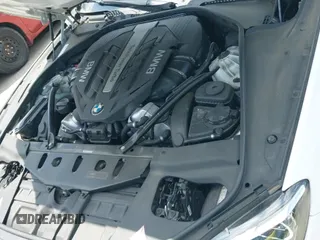2012 BMW 6 Series 650i z VIN WBALX3C5XCC528758, wystawiony jako IAAI lot #42550252 z przebiegiem 50 198 mil mil oraz . Historia ofert i sprzedaży dostępna na DreamBid. Obrazek 19.