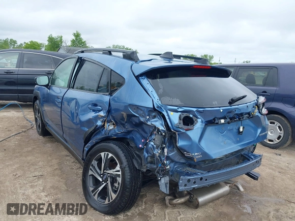 2024 Subaru Crosstrek Premium z VIN JF2GUADC6RH338290, wystawiony jako IAAI lot #42341194 z przebiegiem 10 379 mil mil oraz . Historia ofert i sprzedaży dostępna na DreamBid. Obrazek 3.