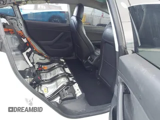 2018 Tesla Model 3 Long Range Battery with VIN 5YJ3E1EA3JF023300, listed as a IAAI auction lot 41925504 with 100,512 mi miles and . Bid and sale history available at DreamBid. Image 8.