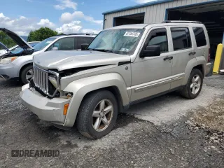 2009 Jeep Liberty Limited with VIN 1J8GN58K09W551552, listed as a Copart auction lot 61184705 with 213,885 mi miles and Salvage title. Bid and sale history available at DreamBid. Image 1.