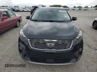 2019 Kia Sorento EX z VIN 5XYPHDA53KG457567, wystawiony jako Copart lot #57665945 z przebiegiem 150 392 mil mil oraz Czysty tytuł • Clean title. Historia ofert i sprzedaży dostępna na DreamBid. Obrazek 5.
