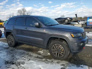 2021 Jeep Grand Cherokee Trailhawk with VIN 1C4RJFLT4MC567460, listed as a Copart auction lot 41455725 with 60,848 mi miles and Salvage Title. Bid and sale history available at carsss.com. Image 4.