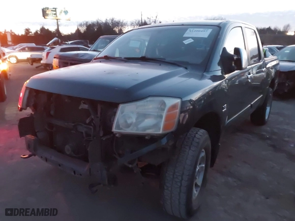 2004 Nissan Titan LE with VIN 1N6AA07B84N511373, listed as a IAAI auction lot 41200457 with 172,783 mi miles. Bid and sale history available at carsss.com. Image 18.