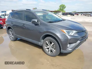 2018 Toyota RAV4 XLE z VIN JTMWFREV0JJ727278, wystawiony jako IAAI lot #42172405 z przebiegiem 143 730 mil mil oraz . Historia ofert i sprzedaży dostępna na DreamBid. Obrazek 1.