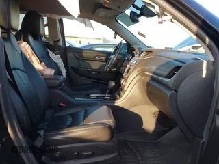 2016 Chevrolet Traverse LTZ z VIN 1GNKRJKD3GJ245438, wystawiony jako IAAI lot #41010372 z przebiegiem 115 264 mil mil oraz . Historia ofert i sprzedaży dostępna na DreamBid. Obrazek 5.