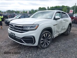 2021 Volkswagen Atlas SEL z VIN 1V2SE2CA7MC214805, wystawiony jako IAAI lot #42374591 z przebiegiem 61 775 mil mil oraz . Historia ofert i sprzedaży dostępna na DreamBid. Obrazek 2.