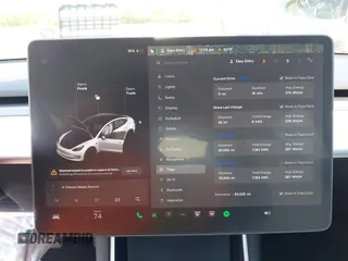 2020 Tesla Model 3 Standard Range Plus with VIN 5YJ3E1EA3LF785951, listed as a IAAI auction lot 41919339 with 63,025 mi miles and . Bid and sale history available at carsss.com. Image 7.