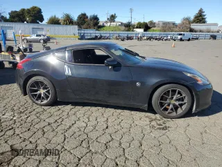 2012 Nissan 370Z Touring with VIN JN1AZ4EH4CM561432, listed as a Copart auction lot 89376935 with 128,955 mi miles and Salvage Title. Bid and sale history available at carsss.com. Image 4.
