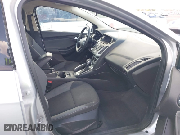 2014 Ford Focus SE z VIN 1FADP3K27EL113632, wystawiony jako IAAI lot #42271518 z przebiegiem 111 687 mil mil oraz . Historia ofert i sprzedaży dostępna na DreamBid. Obrazek 5.