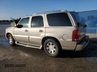 2004 Cadillac Escalade with VIN 1GYEC63T94R208993, listed as a Copart auction lot 87224664 with 285,642 mi miles and Salvage title. Bid and sale history available at DreamBid. Image 2.
