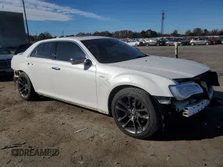 2015 Chrysler 300 C with VIN 2C3CCAET9FH922210, listed as a Copart auction lot 80310864 with 118,931 mi miles and Salvage Title. Bid and sale history available at DreamBid. Image 4.