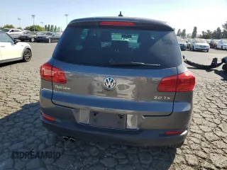 2014 Volkswagen Tiguan SEL with VIN WVGAV3AX8EW585929, listed as a Copart auction lot 61462205 with 63,899 mi miles and Salvage title. Bid and sale history available at DreamBid. Image 6.