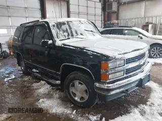 1999 Chevrolet Tahoe Z71 with VIN 1GNEK13R7XJ402254, listed as a IAAI auction lot 41597861 with 215,044 mi miles and . Bid and sale history available at DreamBid. Image 1.