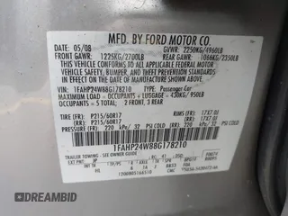 2008 Ford Taurus SEL with VIN 1FAHP24W88G178210, listed as a IAAI auction lot 41933552 with 142,971 mi miles. Bid and sale history available at carsss.com. Image 9.