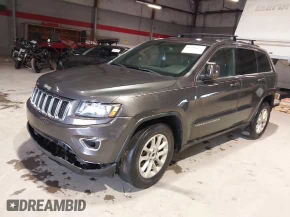 2014 Jeep Grand Cherokee Laredo with VIN 1C4RJEAG7EC145023, listed as a IAAI auction lot 40518825 with 115,098 mi miles and . Bid and sale history available at DreamBid. Image 17.