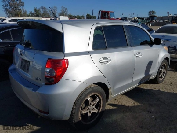 2008 Scion xD with VIN JTKKU10418J018172, listed as a IAAI auction lot 41720610 with 211503 miles. Bid and sale history available at carsss.com. Image 4.