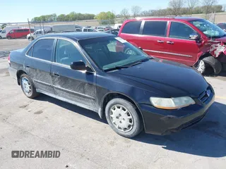 2002 Honda Accord LX z VIN JHMCG56462C016462, wystawiony jako IAAI lot #42149646 z przebiegiem 200 843 mil mil oraz . Historia ofert i sprzedaży dostępna na DreamBid. Obrazek 1.