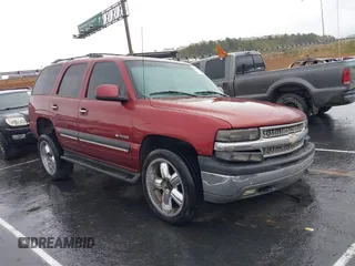 2001 Chevrolet Tahoe LS z VIN 1GNEC13T91R195058, wystawiony jako IAAI lot #41548003 z przebiegiem 148 449 mil mil oraz . Historia ofert i sprzedaży dostępna na DreamBid. Obrazek 1.