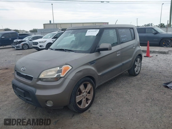 2010 Kia Soul + with VIN KNDJT2A22A7045182, listed as a IAAI auction lot 41322297 with 178,817 mi miles. Bid and sale history available at carsss.com. Image 2.