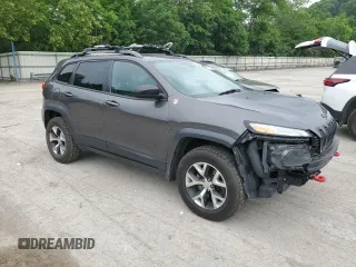 2014 Jeep Cherokee Trailhawk z VIN 1C4PJMBS9EW159721, wystawiony jako Copart lot #60719525 z przebiegiem 136 807 mil mil oraz Szkoda całkowita • Salvage title. Historia ofert i sprzedaży dostępna na DreamBid. Obrazek 4.