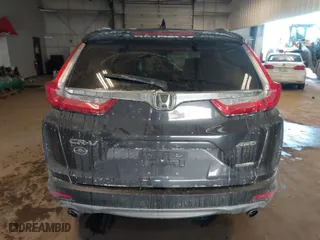 2018 Honda CR-V Touring with VIN 2HKRW2H94JH635053, listed as a IAAI auction lot 41611501 with 76,883 mi miles. Bid and sale history available at carsss.com. Image 16.