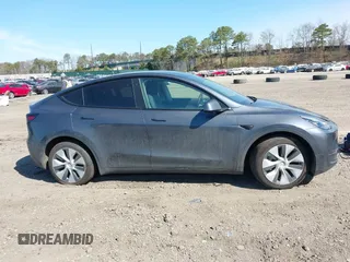 2022 Tesla Model Y Long Range with VIN 7SAYGDEE2NF460945, listed as a IAAI auction lot 41921645 with 62,318 mi miles and . Bid and sale history available at DreamBid. Image 12.