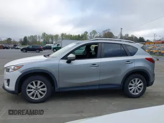 2013 Mazda CX-5 Touring with VIN JM3KE2CE0D0105115, listed as a IAAI auction lot 41899956 with 301,264 mi miles. Bid and sale history available at carsss.com. Image 14.