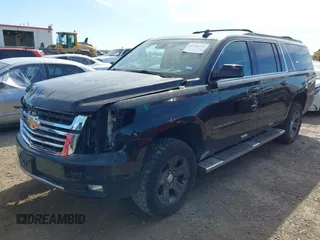2016 Chevrolet Suburban LT with VIN 1GNSKHKC4GR275389, listed as a IAAI auction lot 41796216 with 144,776 mi miles and . Bid and sale history available at DreamBid. Image 2.