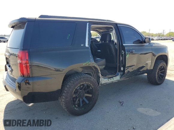 2015 Chevrolet Tahoe LT with VIN 1GNSCBKC2FR115942, listed as a Copart auction lot 54125655 with 132,502 mi miles and Salvage title. Bid and sale history available at DreamBid. Image 3.