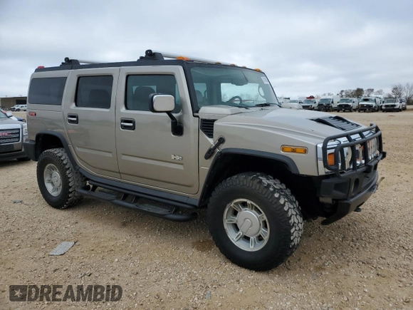 2003 Hummer H2 with VIN 5GRGN23U73H102412, listed as a Copart auction lot 87419024 with 176,456 mi miles and Salvage Title. Bid and sale history available at carsss.com. Image 4.
