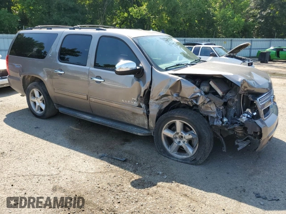 2013 Chevrolet Suburban LT with VIN 1GNSCJE07DR104489, listed as a Copart auction lot 60844784 with 185,420 mi miles and Salvage Title. Bid and sale history available at carsss.com. Image 4.