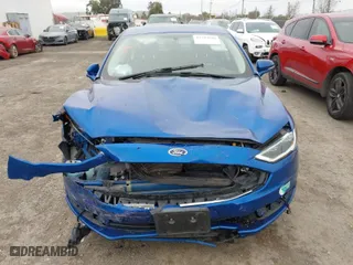 2017 Ford Fusion Energi Titanium with VIN 3FA6P0SU5HR229670, listed as a IAAI auction lot 41594048 with 117,848 mi miles. Bid and sale history available at carsss.com. Image 12.