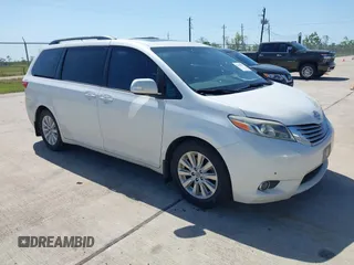 2015 Toyota Sienna XLE with VIN 5TDYK3DC8FS666113, listed as a IAAI auction lot 41999037 with 179,566 mi miles. Bid and sale history available at carsss.com. Image 1.