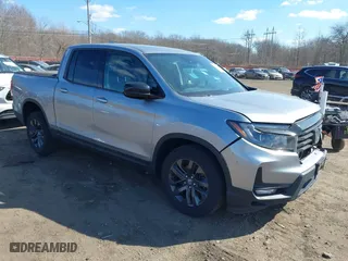 2021 Honda Ridgeline Sport with VIN 5FPYK3F10MB003879, listed as a IAAI auction lot 41677509 with 36,804 mi miles. Bid and sale history available at carsss.com. Image 1.