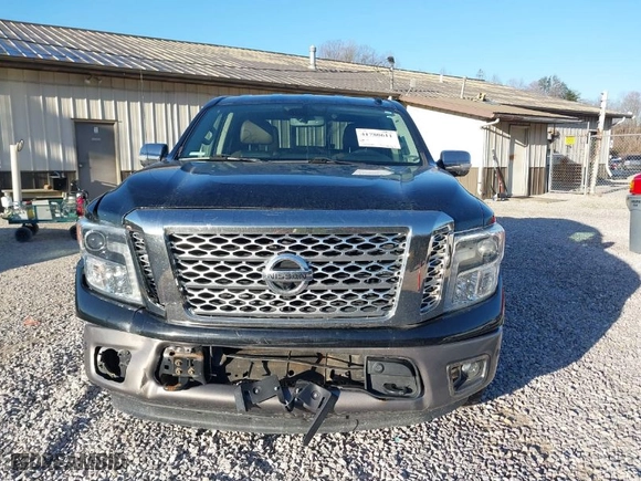 2017 Nissan Titan SV with VIN 1N6AA1E57HN516363, listed as a IAAI auction lot 41780611 with 114,749 mi miles. Bid and sale history available at carsss.com. Image 13.