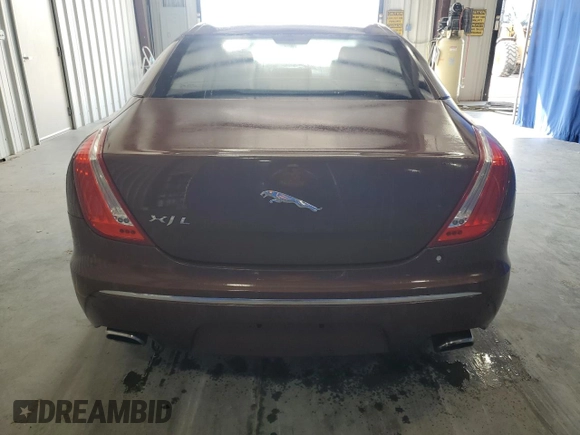 2011 Jaguar XJ XJL z VIN SAJWA2GB8BLV22081, wystawiony jako Copart lot #57088325 z przebiegiem 117 795 mil mil oraz Czysty tytuł • Clean title. Historia ofert i sprzedaży dostępna na DreamBid. Obrazek 6.