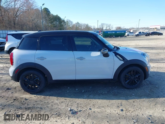 2012 MINI Countryman with VIN WMWZB3C50CWM30524, listed as a IAAI auction lot 41623400 with 194,858 mi miles and . Bid and sale history available at DreamBid. Image 13.