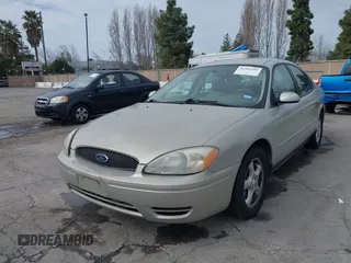 2004 Ford Taurus SES with VIN 1FAFP55U94A108654, listed as a IAAI auction lot 41585381 with 98,843 mi miles and . Bid and sale history available at carsss.com. Image 2.