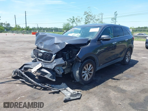 2019 Kia Sorento LX z VIN 5XYPGDA59KG448942, wystawiony jako IAAI lot #42333673 z przebiegiem 172 581 mil mil oraz . Historia ofert i sprzedaży dostępna na DreamBid. Obrazek 2.